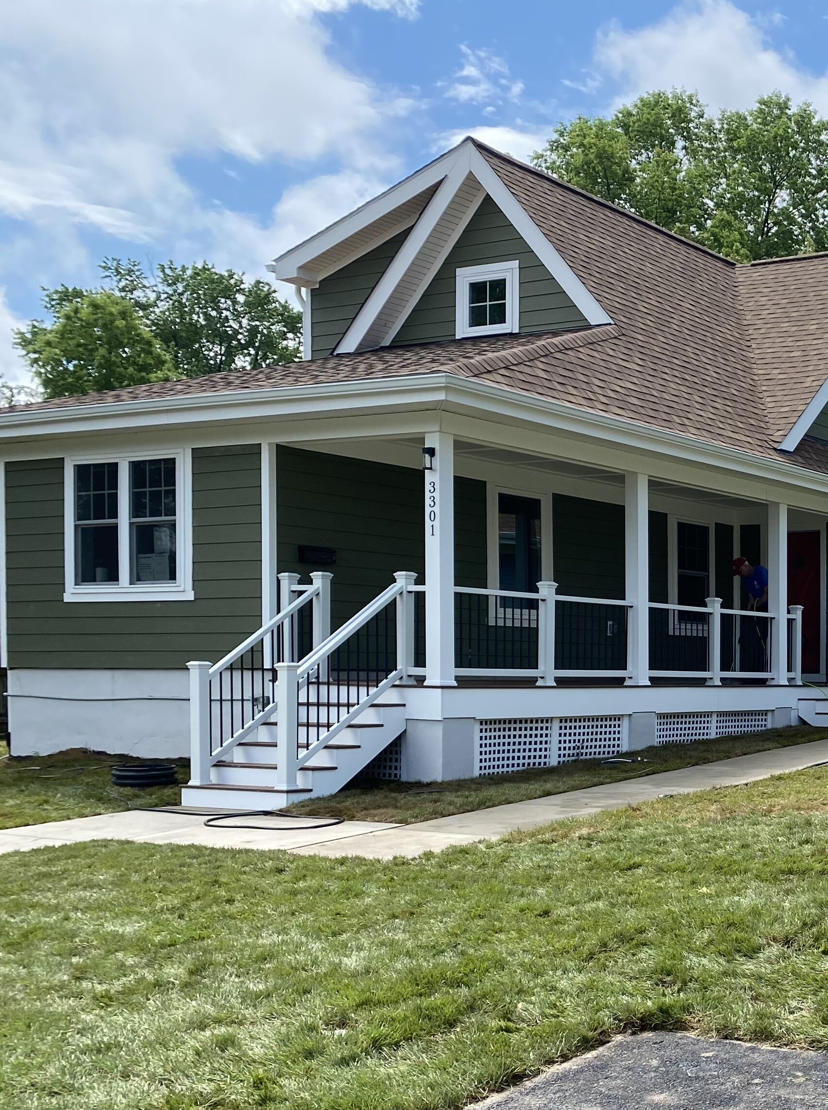 house with stairs leading up the porch
